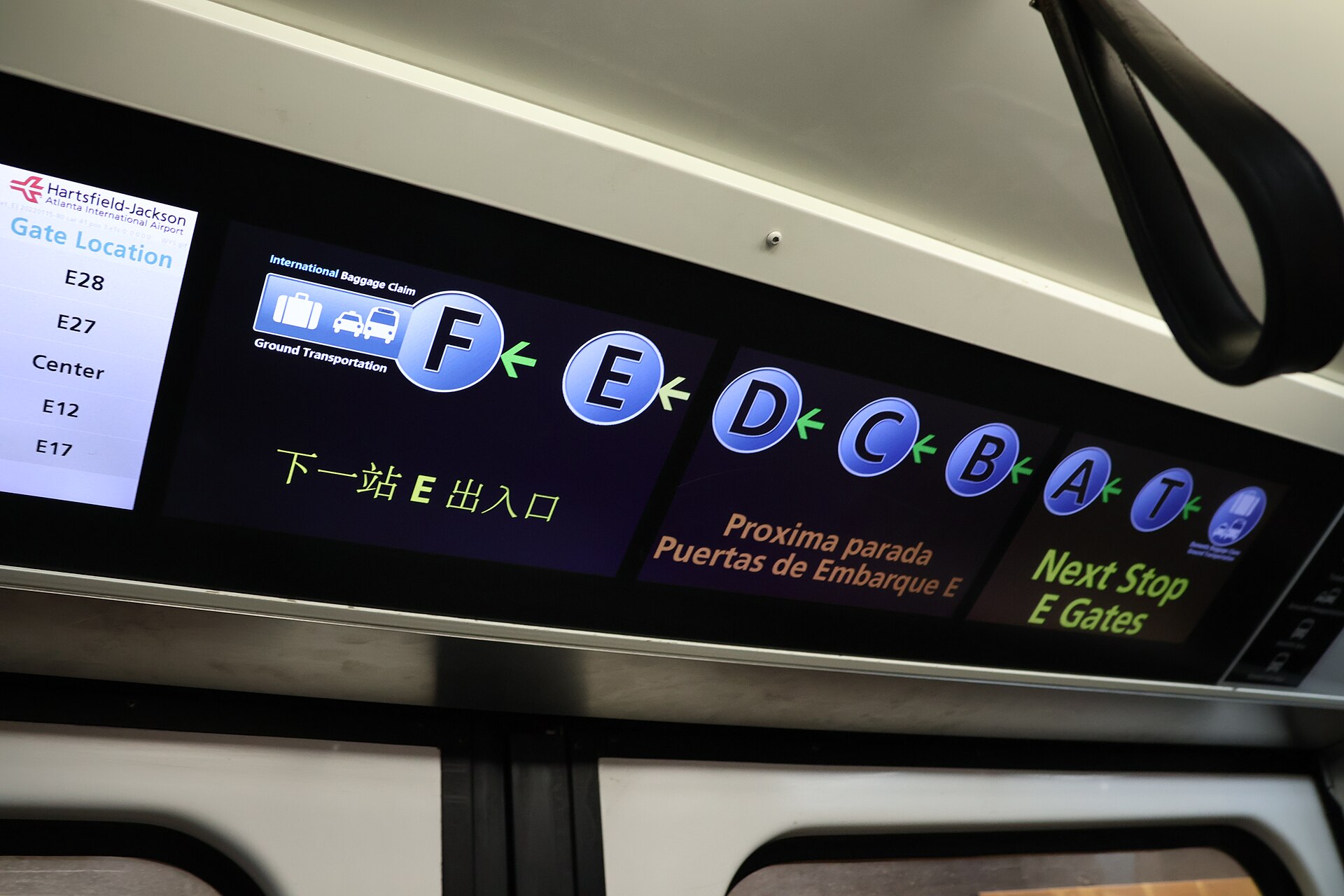 The route display inside ATL's Plane Train, showing stops T, A, B, C, D, E and F and the next stop, E gates.